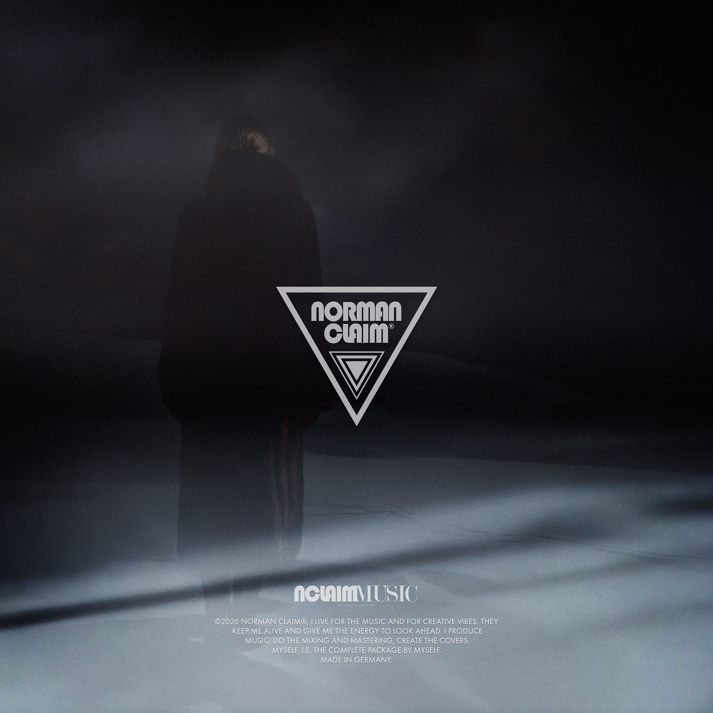 Cover Art (back) - The image features a beautiful woman in a dark fur coat. She moves through the scene like a ghost, her back turned to the viewer, creating a mystical and haunting atmosphere. On the back of the cover is the NORMAN CLAIM logo (triangle version).